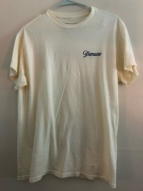 Urban Outfitters Cream Tee with Navy "Demure" Script
